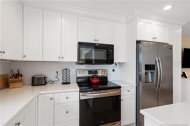 With a peaceful lake view, this fully remodeled, beautifully - photo 12