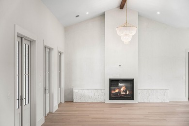 A showstopper of modern coastal elegance, 36 Sandcord Drive is a - photo 13