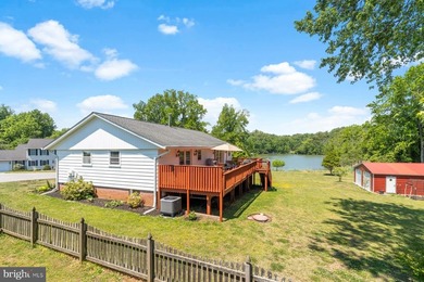 Nestled at the end of a peaceful peninsula in the sought-after - photo 14