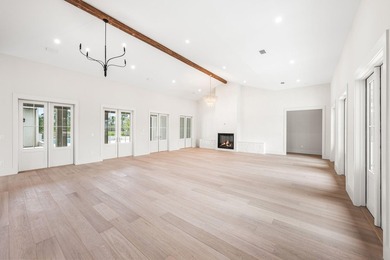 A showstopper of modern coastal elegance, 36 Sandcord Drive is a - photo 15