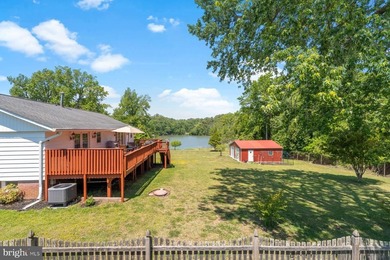 Nestled at the end of a peaceful peninsula in the sought-after - photo 15