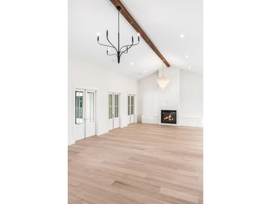 A showstopper of modern coastal elegance, 36 Sandcord Drive is a - photo 16