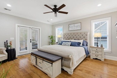 Experience elevated Low-country living at 613 Collins Creek