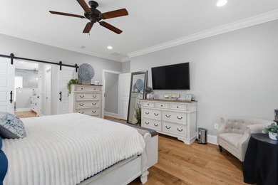 Experience elevated Low-country living at 613 Collins Creek