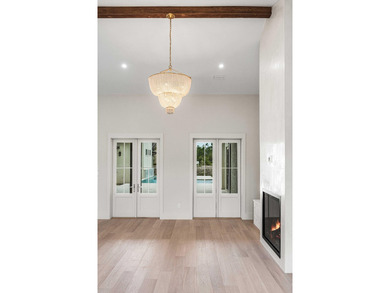A showstopper of modern coastal elegance, 36 Sandcord Drive is a - photo 18