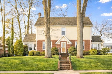 Located in a prime North Flushing neighborhood, this stately - photo 1