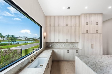 A showstopper of modern coastal elegance, 36 Sandcord Drive is a - photo 22