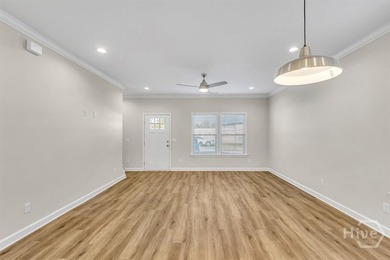 Newly constructed in 2024, this modern 3BR/2.5BA home offers an - photo 2