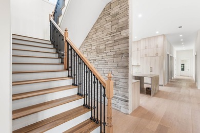 A showstopper of modern coastal elegance, 36 Sandcord Drive is a - photo 24