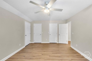 Newly constructed in 2024, this modern 3BR/2.5BA home offers an - photo 5