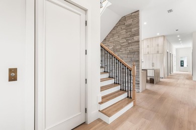 A showstopper of modern coastal elegance, 36 Sandcord Drive is a - photo 27