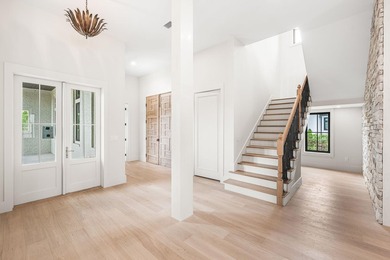 A showstopper of modern coastal elegance, 36 Sandcord Drive is a - photo 28