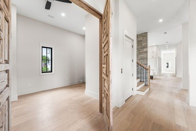 A showstopper of modern coastal elegance, 36 Sandcord Drive is a - photo 31