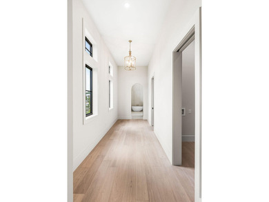 A showstopper of modern coastal elegance, 36 Sandcord Drive is a - photo 34