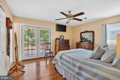 Nestled at the end of a peaceful peninsula in the sought-after - photo 34
