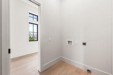 A showstopper of modern coastal elegance, 36 Sandcord Drive is a - photo 37