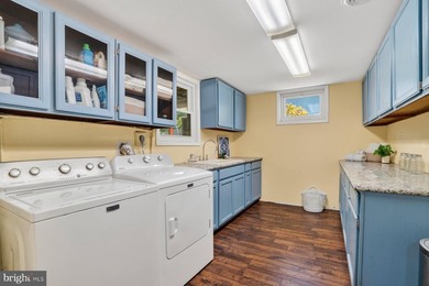 Nestled at the end of a peaceful peninsula in the sought-after - photo 41