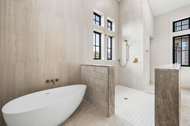 A showstopper of modern coastal elegance, 36 Sandcord Drive is a - photo 43