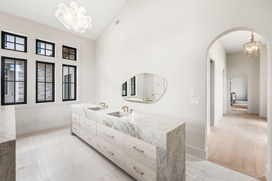 A showstopper of modern coastal elegance, 36 Sandcord Drive is a - photo 44