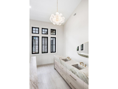 A showstopper of modern coastal elegance, 36 Sandcord Drive is a - photo 46