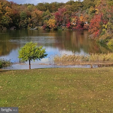 Nestled at the end of a peaceful peninsula in the sought-after - photo 46