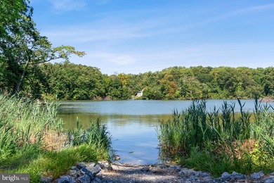 Nestled at the end of a peaceful peninsula in the sought-after - photo 50