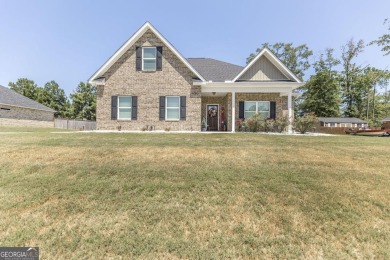 Lake Home For Sale in Lizella, Georgia