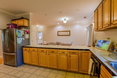 Brick Home with 5 Bedrooms, 3 1/2 Bathrooms, Hardwood/Tile - photo 14