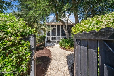 Set along one of Habersham's most charming streets, framed by a - photo 28