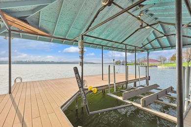 FULLY FURNISHED LAKEFRONT HOME!! Experience elevated lakefront - photo 1