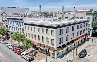 Historic Downtown Architect-Designed Corner Loft Highlights: - photo 1