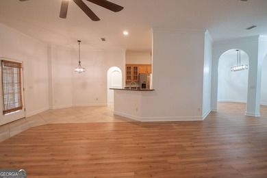 Beautiful well maintained home in Osprey Cove with brand new LVP - photo 12