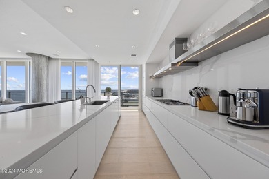 STUNNING 3 bedroom 3 full bath, direct ocean view residence is - photo 18