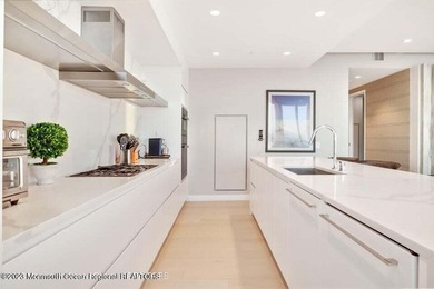 STUNNING 3 bedroom 3 full bath, direct ocean view residence is - photo 19