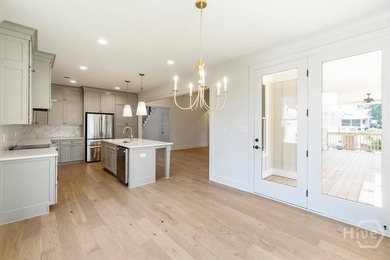 Welcome to 1609 Meadow Lakes Drive This exceptional 6-bedroom - photo 5
