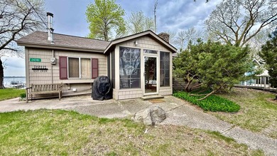 Some lake homes are built to impress. Others are built to be - photo 1