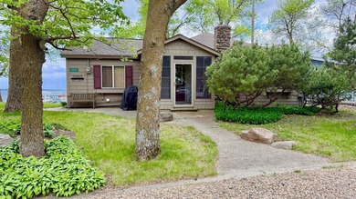 Some lake homes are built to impress. Others are built to be - photo 3