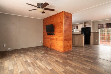 Discover peaceful country living with modern convenience in this