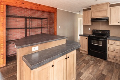 Discover peaceful country living with modern convenience in this