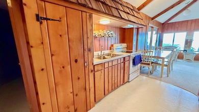 Some lake homes are built to impress. Others are built to be - photo 6