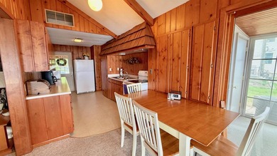 Some lake homes are built to impress. Others are built to be - photo 7
