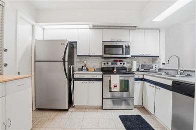 Much desired 2 bedroom /2 bath condo all on ground level located - photo 7