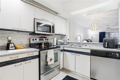 Much desired 2 bedroom /2 bath condo all on ground level located - photo 8