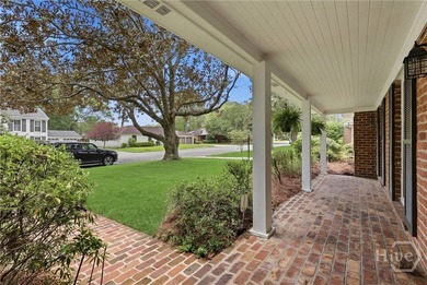 Nestled beneath the canopy of a majestic, mature magnolia tree - photo 4