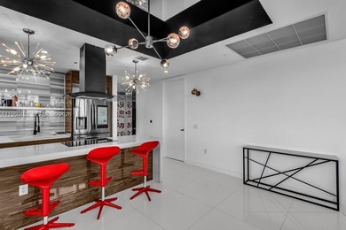 Welcome to Marquis Residence 4907, an oversized two-bedroom sky