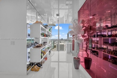 Welcome to Marquis Residence 4907, an oversized two-bedroom sky