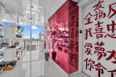 Welcome to Marquis Residence 4907, an oversized two-bedroom sky