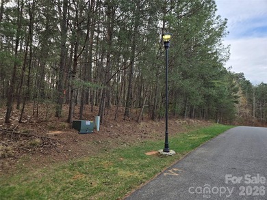 This Badin Lake water view lot is located in the prestigious - photo 1