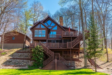 This stunning, premier lakefront log home features native - Lake Home For Sale in Mount Gilead, Ohio