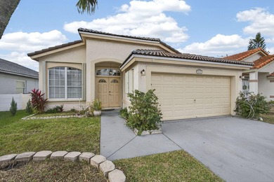 Welcome to this well-maintained CBS home in one of Wellington's - photo 2
